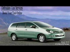 a green van parked in front of mountains