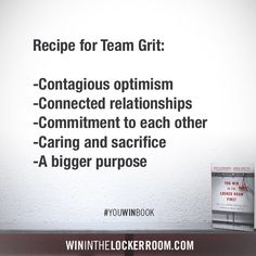 a book sitting on top of a table next to a white wall with the words recipe for team grit