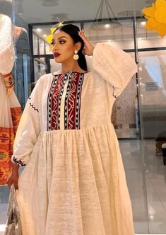 free size Ethiopian hand woven cotton. Bohemian Cotton Handloom Dress, Bohemian Cotton Dress With Weaving Work, White Handloom Summer Dress, Spring Cotton Handloom Dresses, Bohemian Long Sleeve Embroidered Dress With Woven Motifs, Long Dresses With Woven Motifs, Folk Dresses With Woven Motifs And Long Sleeves, White Folk Dress With Weaving Work, Folk Style Tunic Dress With Woven Motifs