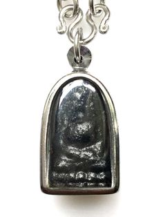 This is a perfect and unique rare protective pendant made of original black leklai metal charm, the power of the amulet it to protect all dangers and brings good luck to the wearer. The pendant showcases an elegant design with rare style. It is great to get this pendant for your loved one or treat yourself for a classic timeless style. Stone Size: 2.5 x 4 cm., Stone Type Leklai:, Metal Type: Stainless , Weight: 37.42 Gram (Approx.) Free 1x rope necklace  Leklai has its own power, it need not to Black Amulet Jewelry For Meditation, Symbolic Black Necklace With Large Pendant, Black Symbolic Necklace With Large Pendant, Black Amulet Necklace With Large Pendant, Black Metal Collectible Necklaces, Black Round Pendant Necklace Collectible, Black Amulet Locket Jewelry, Collectible Black Jewelry With Large Pendant, Nickel-free Black Medallion Jewelry