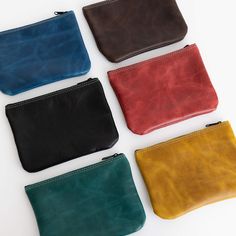 Discover the versatility of our handcrafted leather pouch, meticulously designed for everyday organization. Crafted from top-quality leather with a 7" zipper opening, this pouch is the absolute perfect size to carry all your little odds and ends. Choose from our beautiful soft American leathers colors and experience the perfect blend of style and functionality. Approximate Dimension:7”w | 5.25”h | 5”d American Leather, Leather Conditioner, Odds And Ends, Handcrafted Leather, Everyday Items, Leather Pouch, Leather Handmade, Comfortable Shoes, The Balm