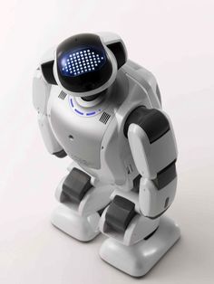 Fujisoft's PALRO humanoid companion robot.  PALRO's 39 centimeters tall (just over a foot), and boasts a 1.6GHz CPU Intel Atom CPU, 1 GB of RAM, 4 GB of flash memory, a 3 MP camera, Wi-Fi, 802.11 b/g/n, and a lithium ion battery, all for $3,000. Vintage Robot Art, Robot Humanoid, Real Robots, Robot Cartoon, Japanese Robot, Vintage Robots, Robot Technology, Humanoid Robot, Computer Programmer