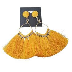 Post Stud Drop Tassel Fan Earrings Mustard Yellow Gold Color Metal New Fashion Jewelry From My Boutique Chelsea's Collection Yellow Fringe Tassel Earrings, Trendy Gold Tassel Earrings For Summer, Yellow Bohemian Earrings With Latkans, Bohemian Yellow Earrings With Latkans, Yellow Fringe Dangle Jewelry, Yellow Fringe Earrings For Summer, Summer Gold Tassel Earrings, Bohemian Yellow Earrings For Party, Yellow Dangle Tassel Earrings Gift