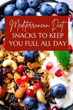 a bowl filled with yogurt, granola and blueberries next to the words mediterranean diet snacks to keep you full all day