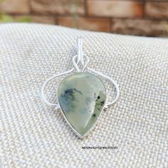 "Welcome To Our Shop :  -  Moonlightjewellerygift Prehnite Pendant, 925 Sterling Silver Pendant, Handmade Pendant, Lovely Pendant, Gemstone  Pendant, Beautiful Pendant, Boho Pendant, Gifts,  Details Handmade item Dispatches from a small business in India Materials: Silver, Stone Gemstone: Prehnite Style: Boho & hippie Description Prehnite Pendant, 925 Sterling Silver, Silver Pendant, Handmade Pendant, Necklace For Women, Simple Pendant, Gift Pendant, Gemstone Pendant, Prehnite Jewelry ----------------------------------------------------------- Prehnite Gemstone Benefits This calming green stone is believed to be useful in strengthening bones, teeth, nails, and alleviating high stress levels. Because of its ability to improve intuition, prehnite stones are considered beneficial for people w Unique Sterling Silver Gemstones For Gifts, Spiritual 925 Stamped Gemstones As Gift, Handmade Silver Gemstones As Gift, Silver May Birthstone Gemstones For Gifts, Elegant Gemstones With Natural Inclusions For Gift, Sterling Silver Jewelry With Natural Inclusions As Gift, Silver Gemstones For May Birthstone Gift, Teardrop Natural Stones Gemstone For Gift, Unique Teardrop Gemstone For Gift