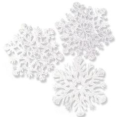 three white snowflakes on a white background