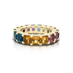 Get Surprise Gift on Purchase of any 18k Gold Jewelry The 5.00 Carat Princess Cut Rainbow Colored Gemstone Eternity Ring is a breathtaking piece that embodies luxury and vibrant beauty. Each gemstone in this ring is princess cut, maximizing the sparkle and showcasing the vivid colors of the rainbow. Set in an eternity band, these stones create a continuous loop of radiant hues, making it a symbol of infinite love and elegance. Perfect for those who appreciate bold and colorful jewelry, this ring Rainbow Diamond, Princess Cut Ring, Sapphire Eternity Ring, Ring Princess Cut, Rainbow Ring, Rainbow Sapphires, Rainbow Rings, Ring Sapphire, Yellow Gemstones