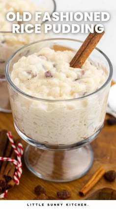 an old fashioned rice pudding in a glass bowl with cinnamon sticks on the side and text overlay