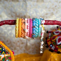 Embroidered Bangle Jewelry For Wedding, Embroidered Bangle For Wedding, Multicolor Embroidered Bangle Jewelry, Traditional Embroidered Bangle Jewelry, Bohemian Beaded Bangle Bracelet For Wedding, Embroidered Bracelets For Wedding And Festivals, Handmade Bangle For Celebrations, Bohemian Embroidered Bracelets For Weddings, Bohemian Embroidered Jewelry For Wedding