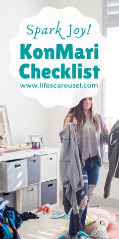 a woman standing in front of a pile of clothes with the words spark joy kommar checklist above her