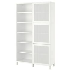 a white bookcase with three shelves on each side