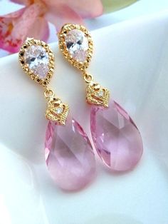 Light Rose Pink Swarovski Pear Drop Crystal with Yellow Gold Plated Peardrop Shape CZ Post Earrings Pink Teardrop Crystal Jewelry, Pink Cubic Zirconia Dangle Earrings, Pink Dangle Earrings With Cubic Zirconia, Pink Teardrop Cubic Zirconia Jewelry, Pink Cubic Zirconia Teardrop Jewelry, Fine Jewelry Pink Teardrop Pendant, Pink Teardrop Pendant Fine Jewelry, Fine Jewelry Pink Teardrop Earrings, Elegant Pink Teardrop Earrings