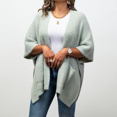 Stay warm and chic in our Monica Cozy Ruana! Made with soft fabric, this ruana features pockets for convenience. Whether you're running errands or going out for a night on the town, the Monica Cozy Ruana provides comfort and style. Oversized Super Soft Winter Outerwear, Cozy Solid Color Poncho For Fall, Casual Oversized Poncho With Pockets, One Size Soft Knit Open Front Outerwear, One Size Open Front Soft Knit Outerwear, One-size Open Front Soft Knit Outerwear, Chic Soft Knit Outerwear One Size, Chic One-size Soft Knit Outerwear, Soft Knit Outerwear For Loungewear, One Size