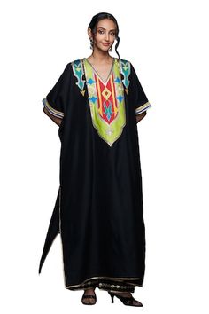 Black cotton silk kaftan featuring abstract and placement gota embroidery, Fit: Relaxed Traditional Silk Kaftan With Embroidered Border, Festive Black Dabka Kaftan, Black Kaftan With Dabka Work For Festive Occasions, Black Dabka Work Kaftan For Festive Occasions, Festive Black Kaftan With Dabka Work, Black Kaftan For Festive Occasions And Festivals, Black Festive Kaftan For Festivals, Festive Black Thobe For Eid, Traditional Black Kaftan With Dabka Work