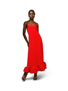 Make a bold statement with Oríré's strappy midi-length dress, crafted from heavyweight crepe in a striking deep orange hue. The ruffled, structured bottom adds a dramatic flair and enhances the dress’s sophisticated silhouette. Style it with sleek pumps and gold accessories for an elegant evening look that stands out. - Single straps, ruffled bottom, midi length - Crepe - Created using sustainable and ethical practices, using artisanal techniques - Each piece is made to order by artisans and can African Luxury, Constellation Earrings, Red Carpet Ready, Deep Orange, Mini Shirt Dress, Gold Accessories, Midi Length Dress, Gold Texture, Slim Pants