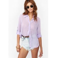 Nasty Gal Lilac Bianca Chiffon Blouse Size: S Color: Purple / Lilac / Mauve / Lavender Worn: purchased Dec '12. Never worn. No tags. Description: Super cute lilac chiffon blouse featuring a button-down front and textured detailing. Button tab at sleeve for easy rolling, loose fit. Perfect paired with shorts and bright shades. A Nasty Gal exclusive. Purchased: from Nasty Gal Material: 100% Polyester Item measurements: 26" length. Model wears size small. Nasty Gal Tops Blouses Awesome Blouse, Chiffon Fashion, Sheer Shirt, Purple Lilac, Beautiful Blouses, Chiffon Blouse, Passion For Fashion, Color Purple, Chic Style