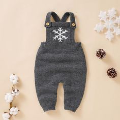 These adorable knit jumpsuits area great combination of warm, cozy and cute all packed in one. Comes in 3 colors. Lay flat to dry Imported CLEARANCE ITEM - LAST FEW IN STOCK! Winter Knitted Long Sleeve Onesie, Winter Cotton Onesie, Cozy Solid Onesie For Winter, Cozy Solid Color Onesie For Winter, Gray Cotton Onesie For Winter, Cozy Winter Loungewear Jumpsuits And Rompers, Gray Long Sleeve Jumpsuits And Rompers For Winter, Winter Cotton Jumpsuits And Rompers For Loungewear, Cotton Long Sleeve Overalls For Winter