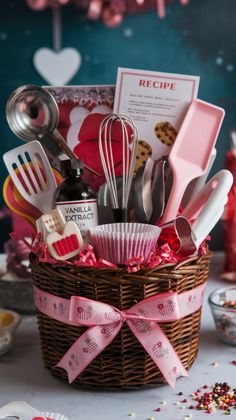 a basket filled with kitchen utensils on top of a table covered in confetti