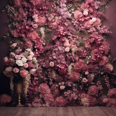 a wall with pink flowers on it