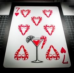 an image of playing cards made to look like hearts and martinis with glasses on them