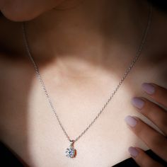 DESCRIPTION ✦ Radiant Elegance: Experience the enchantment of this necklace, featuring a stunning 2.10 carat Round cut Moissanite that exudes timeless charm. ✦ Stone Showcase:Shape: Round Cut MoissaniteWeight Range:2.10 TCWColor: DEF (Colorless)Clarity: VVS✦ Crafted to Perfection:Metal Choices: Crafted in Gold (14KT, 18KT)Tonal Variety: Choose from Yellow, White, or Rose Gold✦ Chain Length Options16inches+2inches extender ✦ Embody sophistication with this exquisitely crafted pendant, merging cla