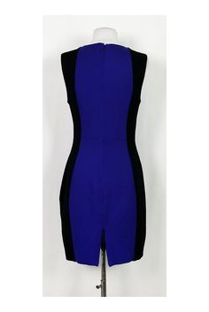 Take this chic dress straight from the office to after-hours. Made in a color-blocked design, it can be styled with silver-tone accessories. Size 8 69% rayon, 29% nylon, 2% spandex Rounded neckline Sleeveless Back zipper Lined Above knee Bust 34" Waist 29" Shoulder to hem 35" Elegant Color Block Party Dress, Elegant Color Block Mini Dress For Party, Elegant Color Block Mini Dress, Sleeveless Color Block Dress For Night Out, Elegant Mini Length Color Block Dress, Chic Color Block Mini Dress For Party, Elegant Fitted Color Block Mini Dress, Party Color Block Knee-length Dress, Blue Color Block Party Dress