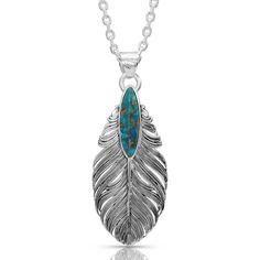 "Santa Fe" Ruffled Feather Turquoise Necklace Because really, what's a better way to create a stunning statement jewelry accessory than combining antiqued silver and turquoise? Inspired by the aura of Santa Fe, NM with its Southwestern flair this feather necklace pendant is an amazing piece. The large, wide antiqued silver-finished feather design has a rippling feather fletching, giving the feather a scalloped edge as it falls downwards. A beautiful elongated oval-shaped compressed turquoise wit Copper Etching, Precious Metal Clay Jewelry, Silversmith Jewelry, Silversmith Jewellery, Metalsmithing Jewelry, Metal Clay Jewelry, Feather Necklace, Precious Metal Clay, Spoon Jewelry