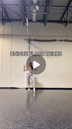 a woman standing in front of a white wall with the words unique floor tricks