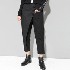 Stretch Ankle-length Harem Pants For Workwear, Spring Baggy Bottoms For Business Casual, Spring Business Casual Baggy Bottoms, Spring Straight Leg Pants With Button Cuffs, Casual Ankle-length Dress Pants With Button Closure, Fitted Winter Cargo Pants For Workwear, Versatile Harem Pants For Work, Ankle-length, Stretch Tapered Leg Harem Pants For Work, High Waist Harem Pants For Work