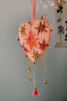 a heart shaped ornament hanging from the ceiling