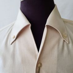 This Jack Lipson Shirt Has An Open Collared Design (No Top Button) With Button Down Collar. Made For 100% Cotton Broadcloth. Size Large, Fits More Like An Extra Large. Great For That Guy "In Between" Sizes Fitted Cotton Dress Shirt With Casual Collar, Fitted Shirt With Casual Collar, Beige Collared Tops For Business, Beige Button-up Business Tops, Beige Button-up Top For Business, Beige Fitted Top For Semi-formal Occasions, Fitted Beige Top For Semi-formal Occasions, Cream Formal Shirt With Spread Collar, Formal Cream Shirt With Spread Collar