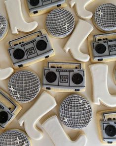 decorated cookies with music instruments and speakers on them