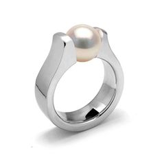 High settings tension set white cultured pearl ring with Stainless Steel mounting. Marea Collection, Inspired by linear and minimal beauty, this design epitomizes modern and minimalist simplicity. This mounting all around is flat. Marea Collection Hypoallergenic comfort fit mounting in Stainless Steel 316 Dimension Pearl: 6.5mm Shank width: 5mm (3mm thick) Metal finish options: polished, polished and brushed * This ring will be specifically crafted for you, will ship in 1 to 2 weeks - Free USA s Minimal Beauty, Cultured Pearl Ring, Tension Setting, Classic Ring, Metal Finishes, Pricing Jewelry, Stainless Steel Jewelry, Pearl Ring, Cultured Pearls