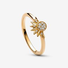 Radiate summer energy with the Celestial Sparkling Sun Ring. This hand-finished ring glows in 14k gold-plating, with a sun motif in the centre formed by a circle of clear pavé with rays emanating from one side. Wear it by itself as a symbol of energy, positivity and life, or stack it with its counterpart, the Celestial Blue Sparkling Moon Ring. The two rings fit perfectly together, representing duality and harmony in nature and within ourselves. 14k Gold-plated unique metal blend Disney Jewelry Rings, Sun Ring, Moon And Star Ring, Charms Pandora, Daisy Ring, Moon Ring, Disney Jewelry, Star Jewelry, Star Ring