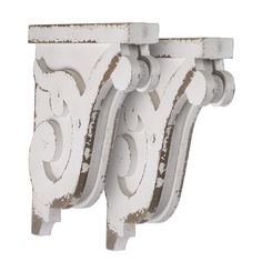 two white wooden corbge brackets on a white background