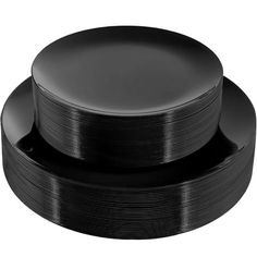 black plates stacked on top of each other