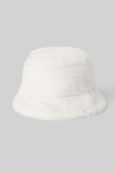 Lightweight. Super-soft. Street-ready. The Faux Fur Bucket Hat is the perfect choice for warming winter headwear in an on-trend bucket hat silhouette. Hat Silhouette, Winter Headwear, Gym Bag Essentials, Faux Fur Bucket Hat, Fur Bucket, Fur Bucket Hat, Bucket Hat Black, Yoga Gear, Essential Bag