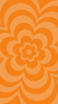 an orange and white flower is in the middle of a pattern that looks like waves