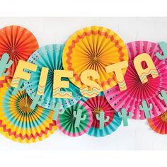 colorful paper fans with the word fiesta written on them