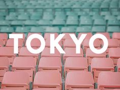 rows of pink seats with the words tokyo in white overlaying it's image