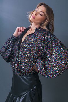 The Freedom Calls Sequin Top combines timeless design with modern style. It features a shirt collar, long sleeves, and an elasticized waistband for a figure-flattering fit. The glimmering sequins add a touch of glamour to any occasion. Details Self : 100% Polyester Lining : 100% Polyester Size & Fit - Model is 5`8" And Wearing Size Small - Measurements Taken From Size Small - Approx. Length: 21" Visor Hairstyles, Knitted Swimsuit, Flying Tomato, Fuchsia Color, Judy Blue Jeans, Vintage Inspired Design, Sequin Top, Swimsuit Cover, Summer Hats