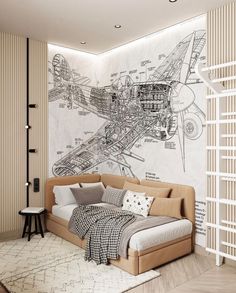 an airplane wall mural in a bedroom with a bed and pillows on the floor next to it