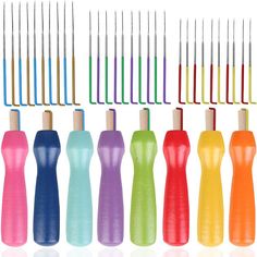 several different colored toothbrushes lined up next to each other on a white background