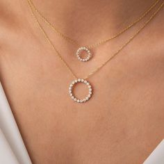 Adorn yourself with our exquisite floating diamond circle necklace. Available in 2 sizes, this floating diamond circle pendant symbolizes the everlasting circle of Life. Whether worn as a statement piece or for everyday elegance, this gold circle necklace radiates timeless beauty. Alternatively, choose from our options of lab-grown diamonds or dazzling moissanites at three different price points to fit your unique preferences and budget. Please check below to see specifications of each stone opt Luxury Circle Necklaces In Elegant Style, Round Necklace Gold, Daily Wear Pendants, Gold Circular Diamond Necklace, Elegant Yellow Gold Open Circle Diamond Necklace, Small Diamond Pendant, Diamond Circle Necklace, Diamond Circle Pendant, Gold Circle Necklace