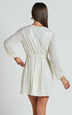 Three Of Us Mini Dress - Long Sleeve Wrap Dress in White Sequin | Showpo USA White Party Dresses With Contrast Sequins, White Mini Length Sequin Dress, Glamorous White Mini Dress With Contrast Sequin, White Sequin Dress For Party Season, Chic White Sequin Party Dress, Chic White Sequin Dress For Prom, White Glamorous Dress With Contrast Sequin, Glamorous White Mini Dress For Holidays, Glamorous White Dress With Contrast Sequin