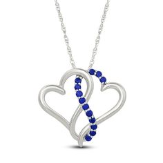 Two hearts collide in the prettiest way in this sweet and shimmering necklace. Sterling silver Two open hearts are entwined in the polished pendant Along the center, a curved ribbon of round blue lab-created sapphires shines 18-inch rope chain; spring ring clasp Sapphire Heart Pendant Necklace In Sterling Silver, Sapphire Sterling Silver Heart Pendant Necklace, Sapphire Heart Necklaces For Anniversary, Sapphire Heart Necklace In Sterling Silver, Sapphire Heart Sterling Silver Necklace, Heart-shaped Sapphire Necklace In Sterling Silver, Sapphire Heart Necklace For Anniversary, Heart-shaped Sapphire Necklace For Anniversary, Elegant Blue Heart Necklace For Mother's Day