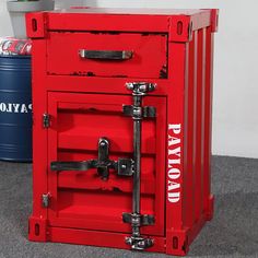 a red metal box with the word pay now on it's front and side