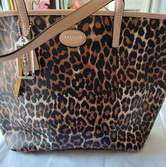 Worn Once. Was Given To Me As A Gift. Well Taken Care Of. Don't Have The Original Packaging. Cheetah Print. Tote Bag. #Y2k #Mcbling #Cheetah Elegant Leopard Print Tote Bag, Leopard Print Tote Shoulder Bag With Handles, Y2k Mcbling, Bag Y2k, Leopard Print Rectangular Shoulder Bag With Gold-tone Hardware, Leopard Print Shoulder Bag With Gold-tone Hardware, Leopard Print Tote Shoulder Bag With Gold-tone Hardware, Bags Coach, Print Tote