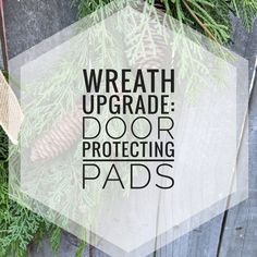 the words wreath upgrade door protecting pads on top of pine cones and evergreen branches with text overlay that reads wreath upgrade door protecting pads