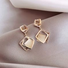 $14.99 - 27 Styles You can definitely find your favorite cat's eye earrings! Korean Earrings, Daisy Studs, Korean Jewelry, Fancy Earrings, Opal Earrings Stud, Jewelry Accessories Ideas, Square Earrings Studs, Square Stud, Fancy Jewellery